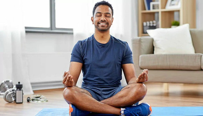 mental-health-covid-19-1024x585 A man keeping his cool by doing yoga
