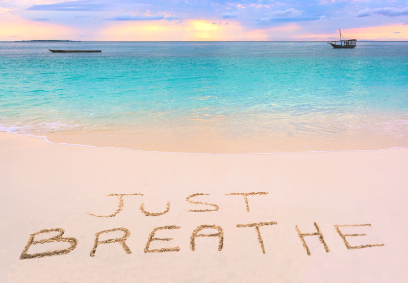 Breathe-In-Breathe-Out-5.19.21 "Just Breathe" written in the shore of a ocean