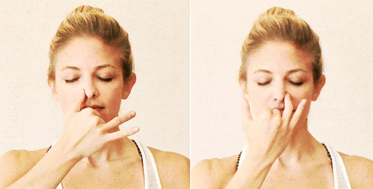 Nadi-Suddhi-Pranayama-alternate-nostril-breath-feature A Woman showing alternate nostril breath excercise