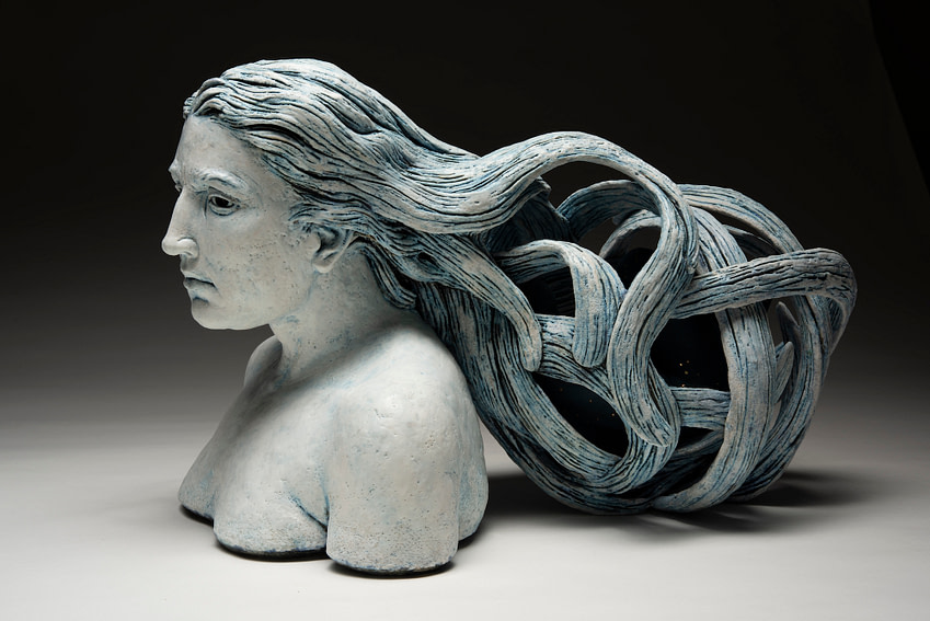 arleo-1 A Clay Sculpture of a woman's face